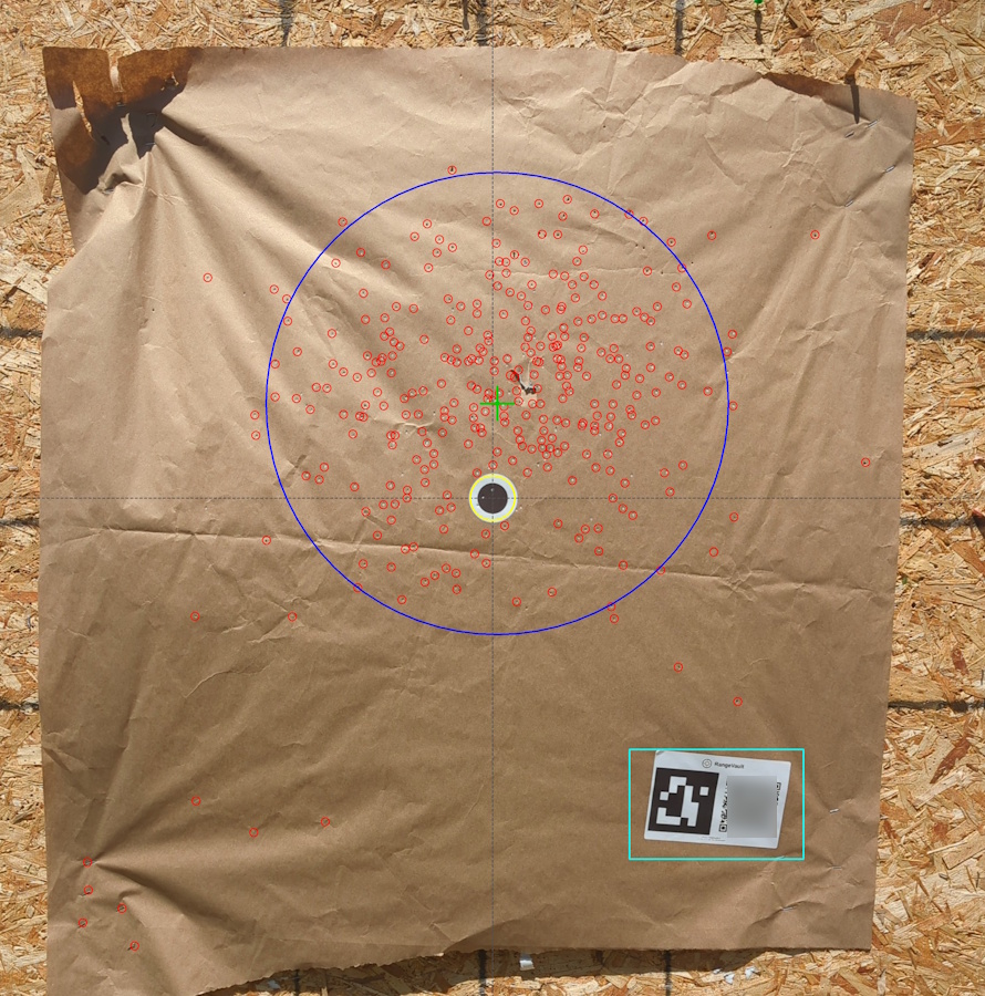 Shotgun pattern on target showing pellet distribution through sticker